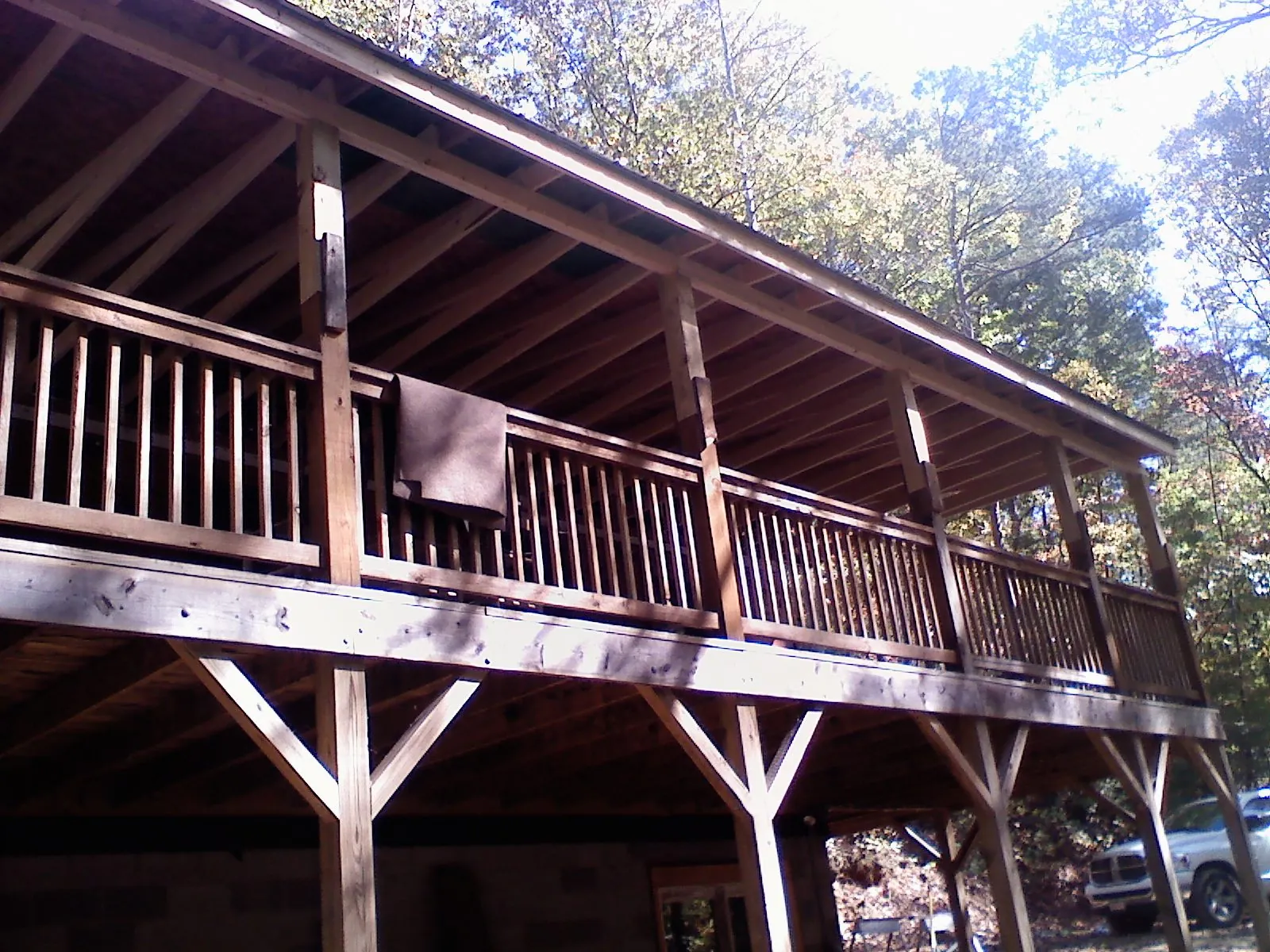 Timber framing under a new elevated porch and deck — Roof Leak Repair in Millican by Roofing Brothers